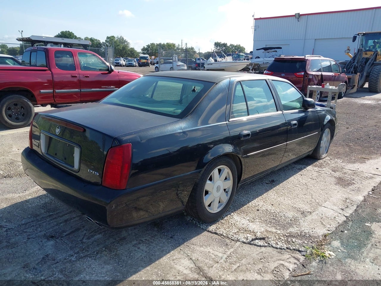 1G6KF54993U****** · 2003 CADILLAC DEVILLE DTS · 4/11