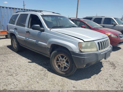 1J4GW48S44C****** · 2004 JEEP GRAND CHEROKEE LAREDO
