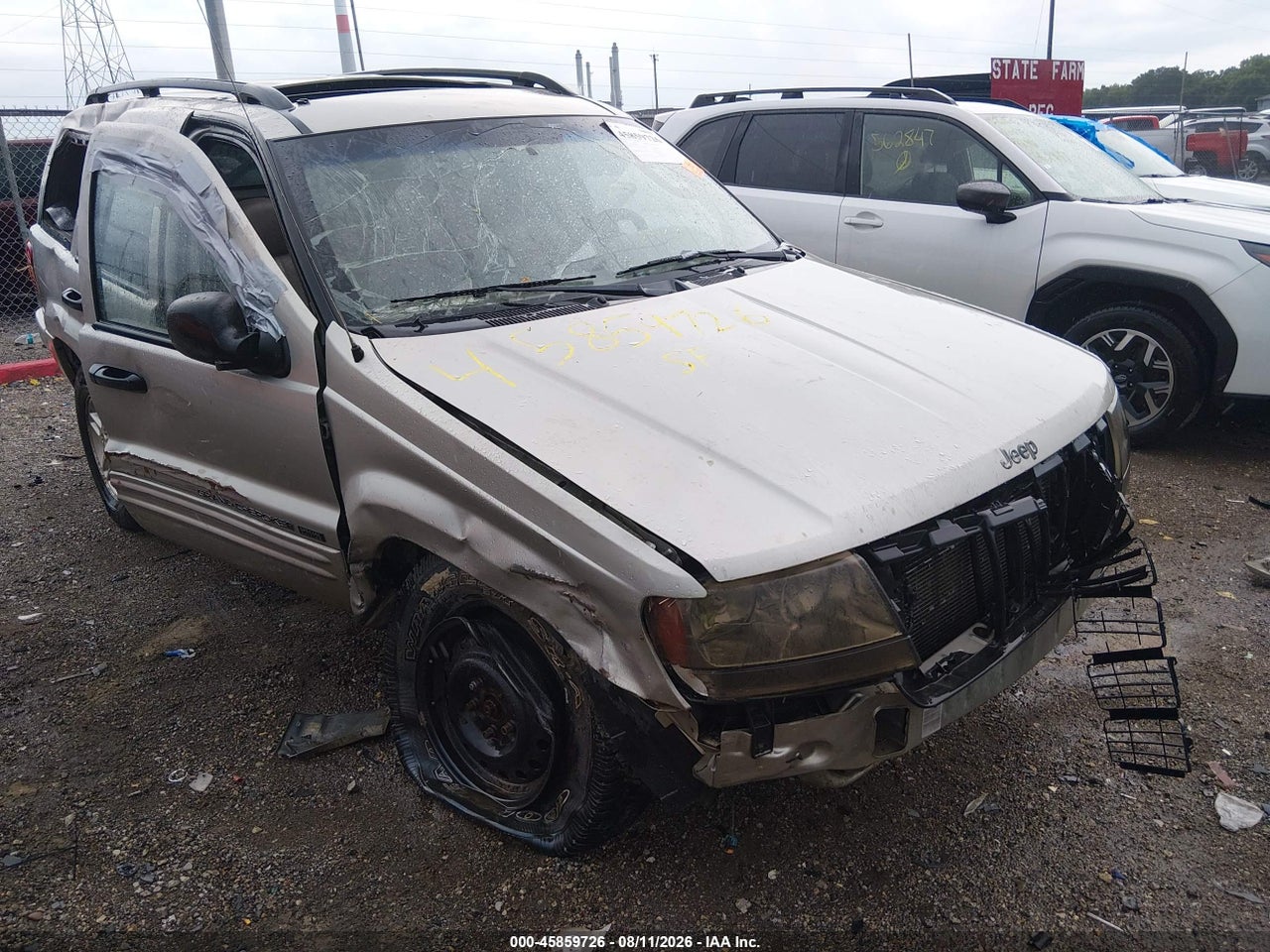 1J4GW48SX4C****** · 2004 JEEP GRAND CHEROKEE LAREDO