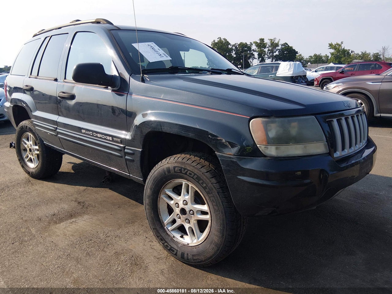 1J8GW48SX4C****** · 2004 JEEP GRAND CHEROKEE LAREDO