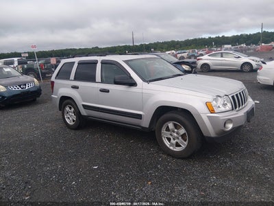 1J4GR48KX5C****** · 2005 JEEP GRAND CHEROKEE LAREDO