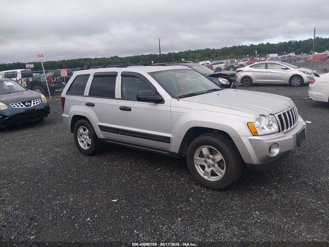 1J4GR48KX5C****** · 2005 JEEP GRAND CHEROKEE LAREDO