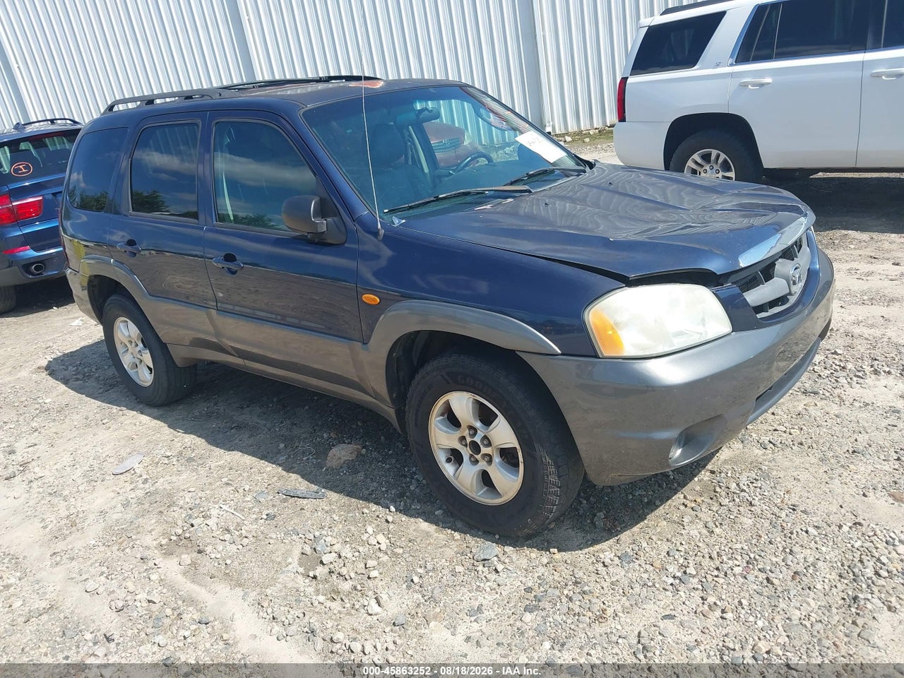 4F2CZ06103K****** · 2003 MAZDA TRIBUTE ES V6