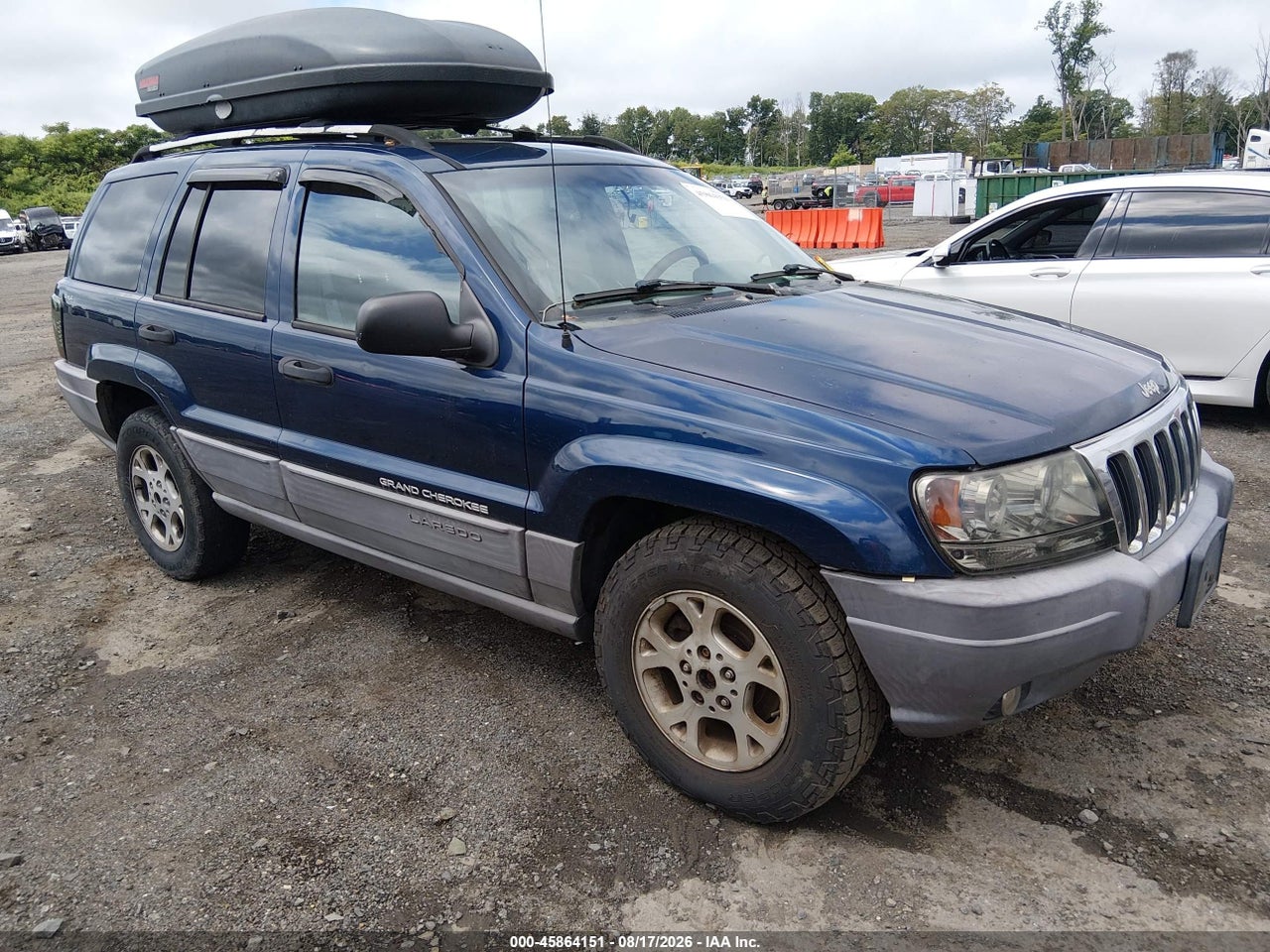 1J4GW58S8XC****** · 1999 JEEP GRAND CHEROKEE LAREDO