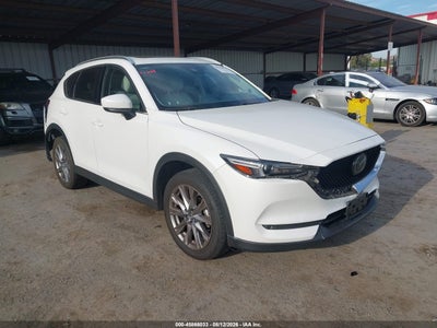 JM3KFBDM5M0****** · 2021 MAZDA CX-5 GRAND TOURING