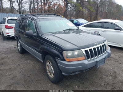 1J4GW48S61C****** · 2001 JEEP GRAND CHEROKEE LAREDO