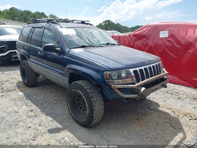 1J4GX48SX2C****** · 2002 JEEP GRAND CHEROKEE LAREDO