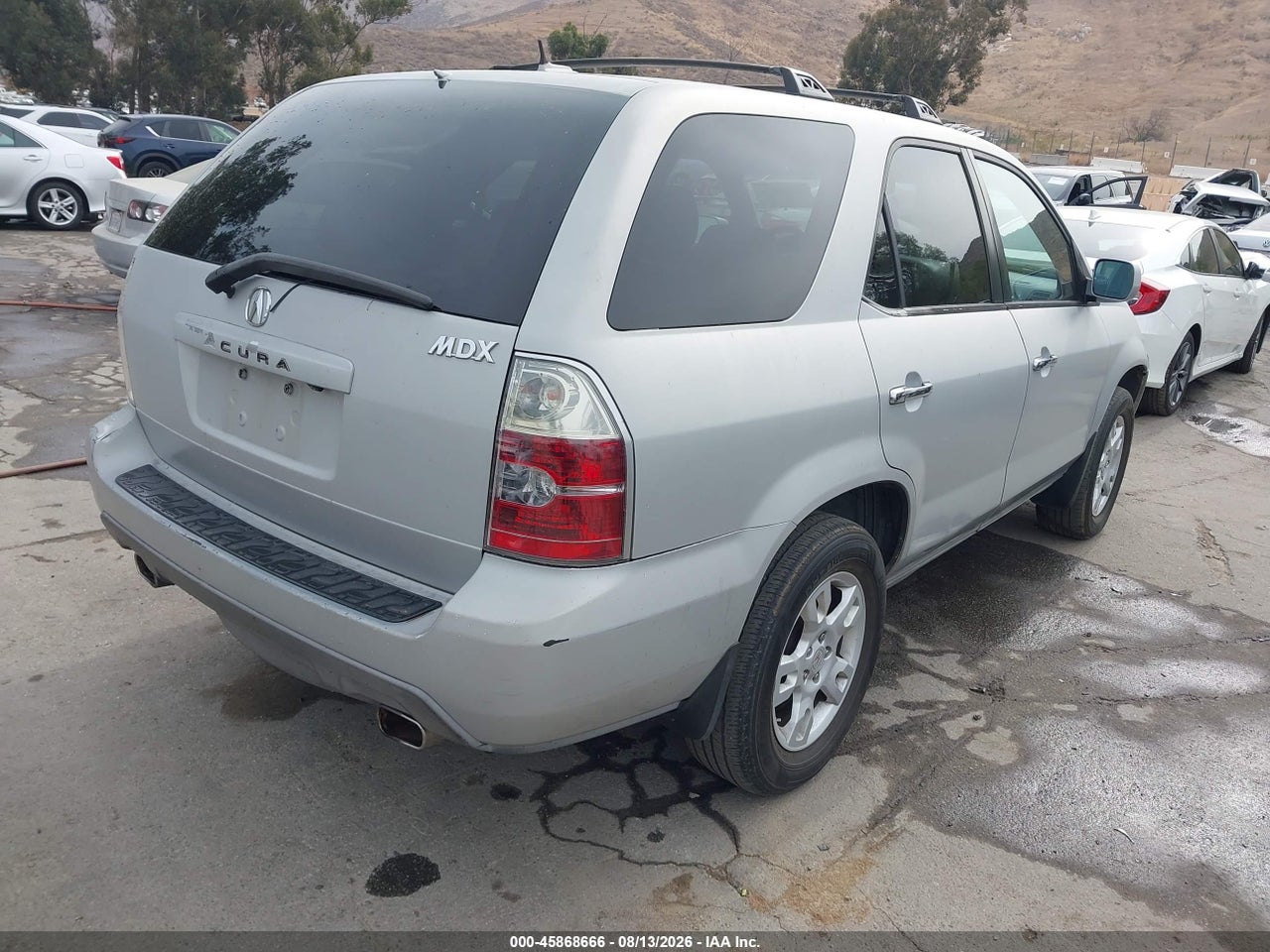 2HNYD18956H****** · 2006 ACURA MDX · 4/11