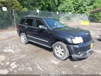 1J8GR48K38C****** · 2008 JEEP GRAND CHEROKEE LAREDO