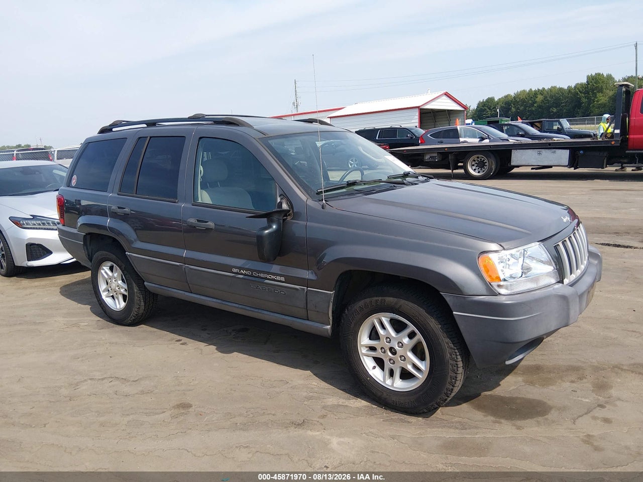 1J4GW48S54C****** · 2004 JEEP GRAND CHEROKEE LAREDO