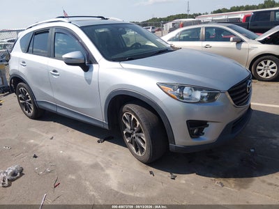 JM3KE2DY6G0****** · 2016 MAZDA CX-5 GRAND TOURING