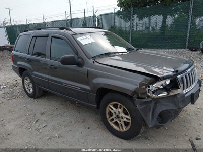 1J4GW48SX4C****** · 2004 JEEP GRAND CHEROKEE LAREDO