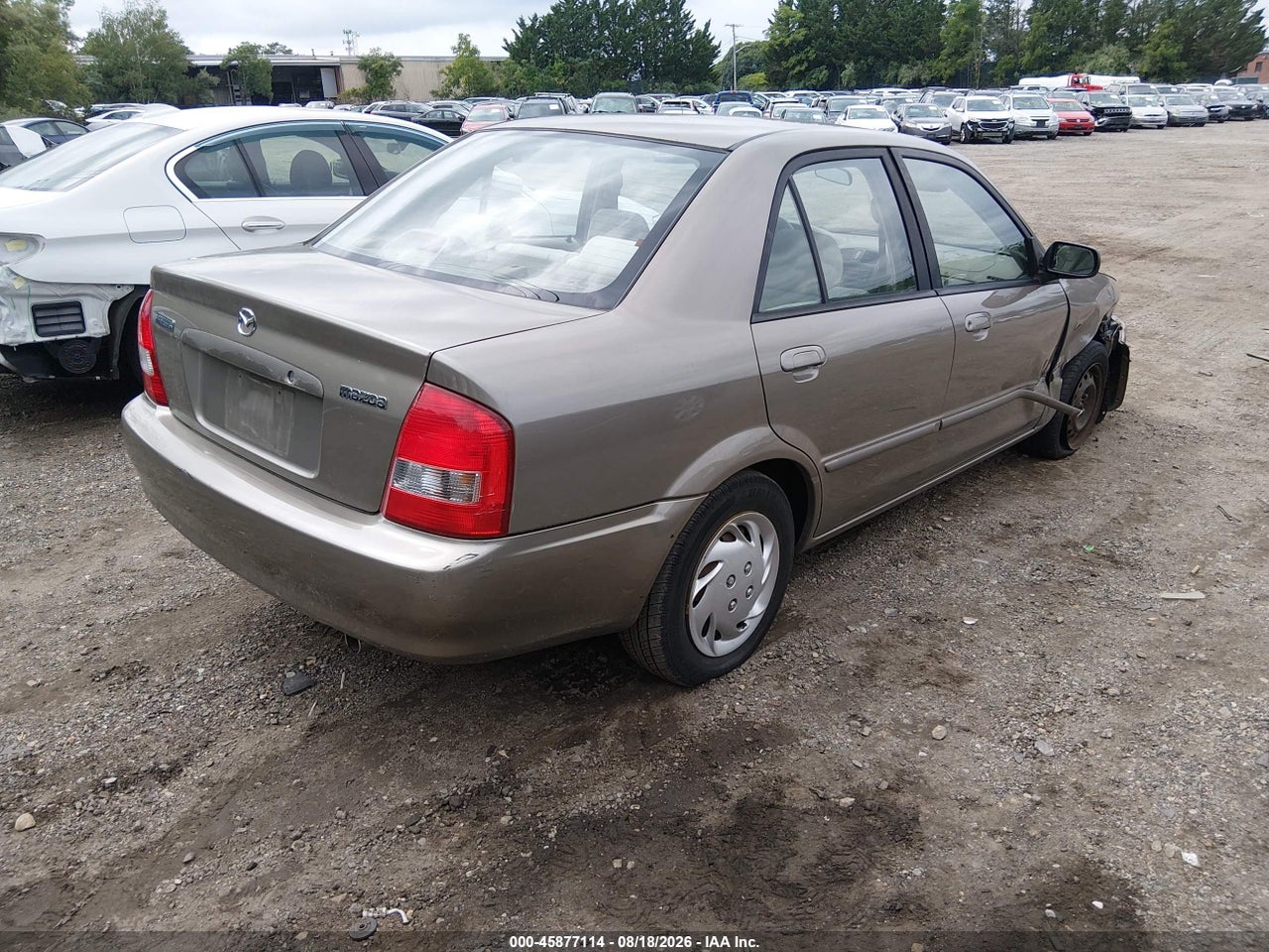 2000 MAZDA PROTEGE DX/LX · 4/11