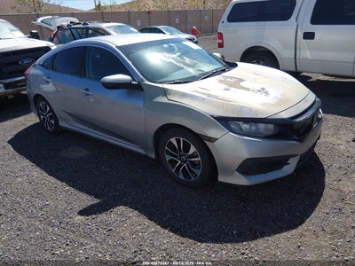 2HGFC2F59JH****** · 2018 HONDA CIVIC LX