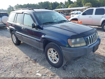 1J4GX48S34C****** · 2004 JEEP GRAND CHEROKEE LAREDO