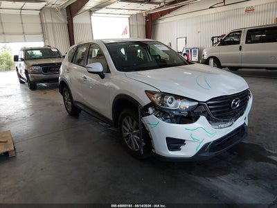 JM3KE4BY2G0****** · 2016 MAZDA CX-5 SPORT