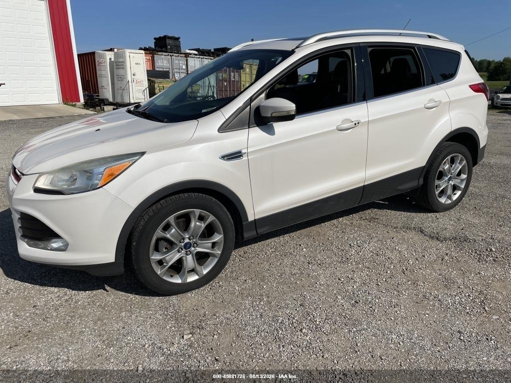 1FMCU0J94EU****** · 2014 FORD ESCAPE TITANIUM · 2/11