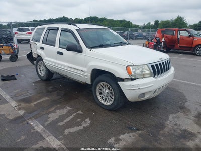 1J4GW48S02C****** · 2002 JEEP GRAND CHEROKEE LAREDO