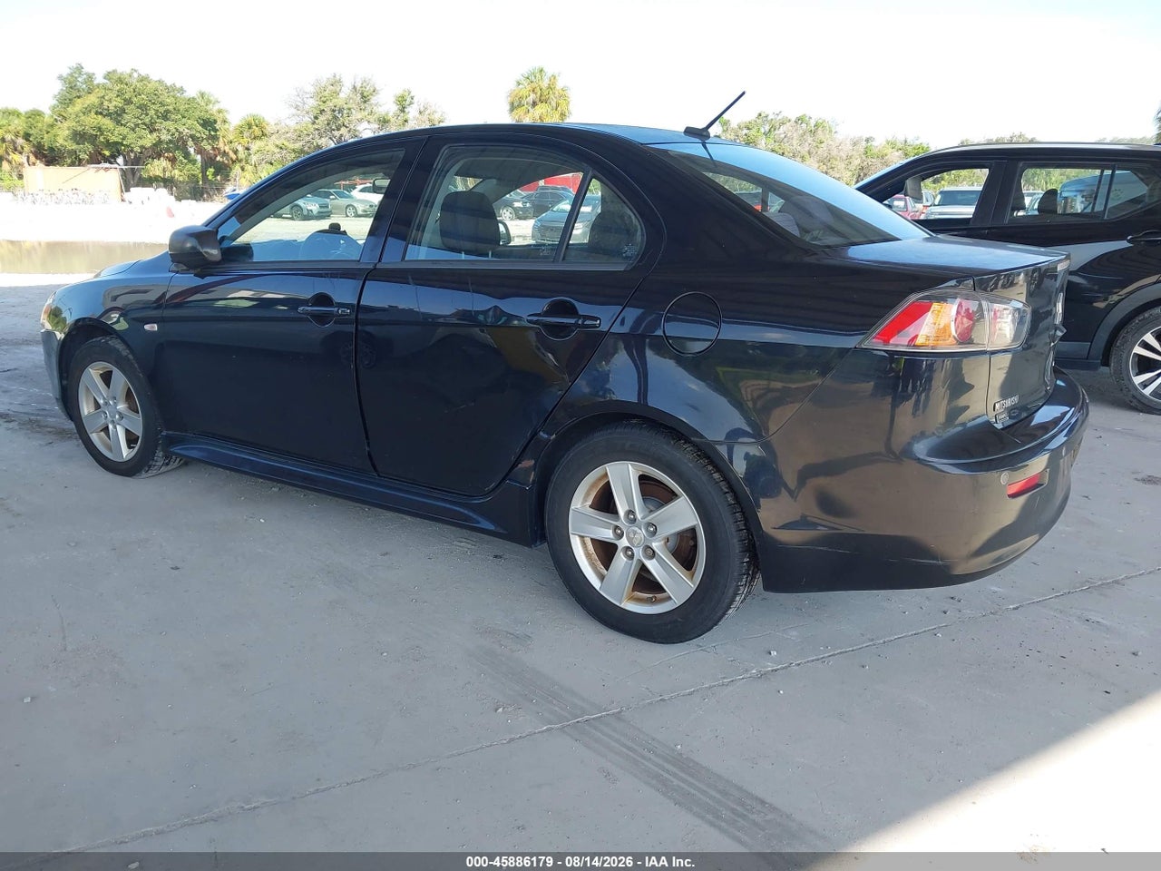 JA32V2FW1EU****** · 2014 MITSUBISHI LANCER SE · 3/11