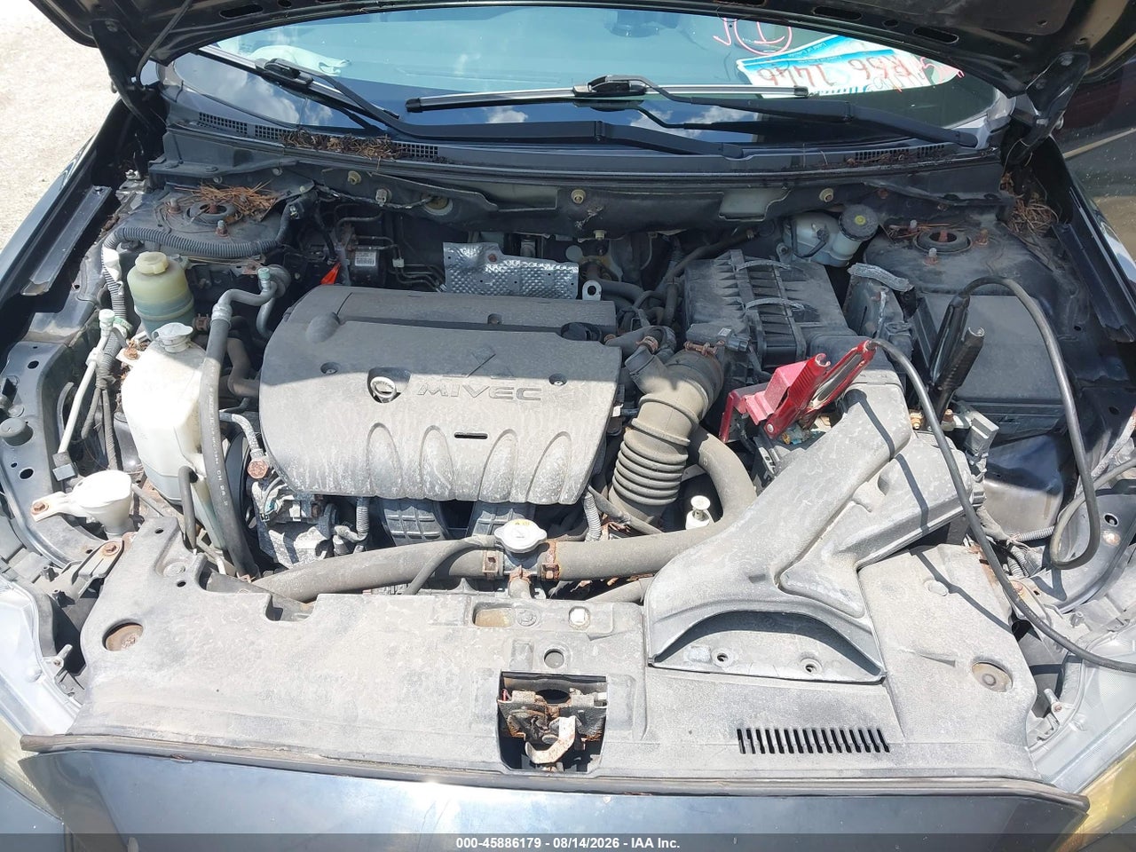 JA32V2FW1EU****** · 2014 MITSUBISHI LANCER SE · 10/11
