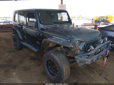 1J4BA3H12BL****** · 2011 JEEP WRANGLER UNLIMITED SPORT