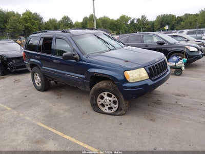 1J4GW48S34C****** · 2004 JEEP GRAND CHEROKEE LAREDO