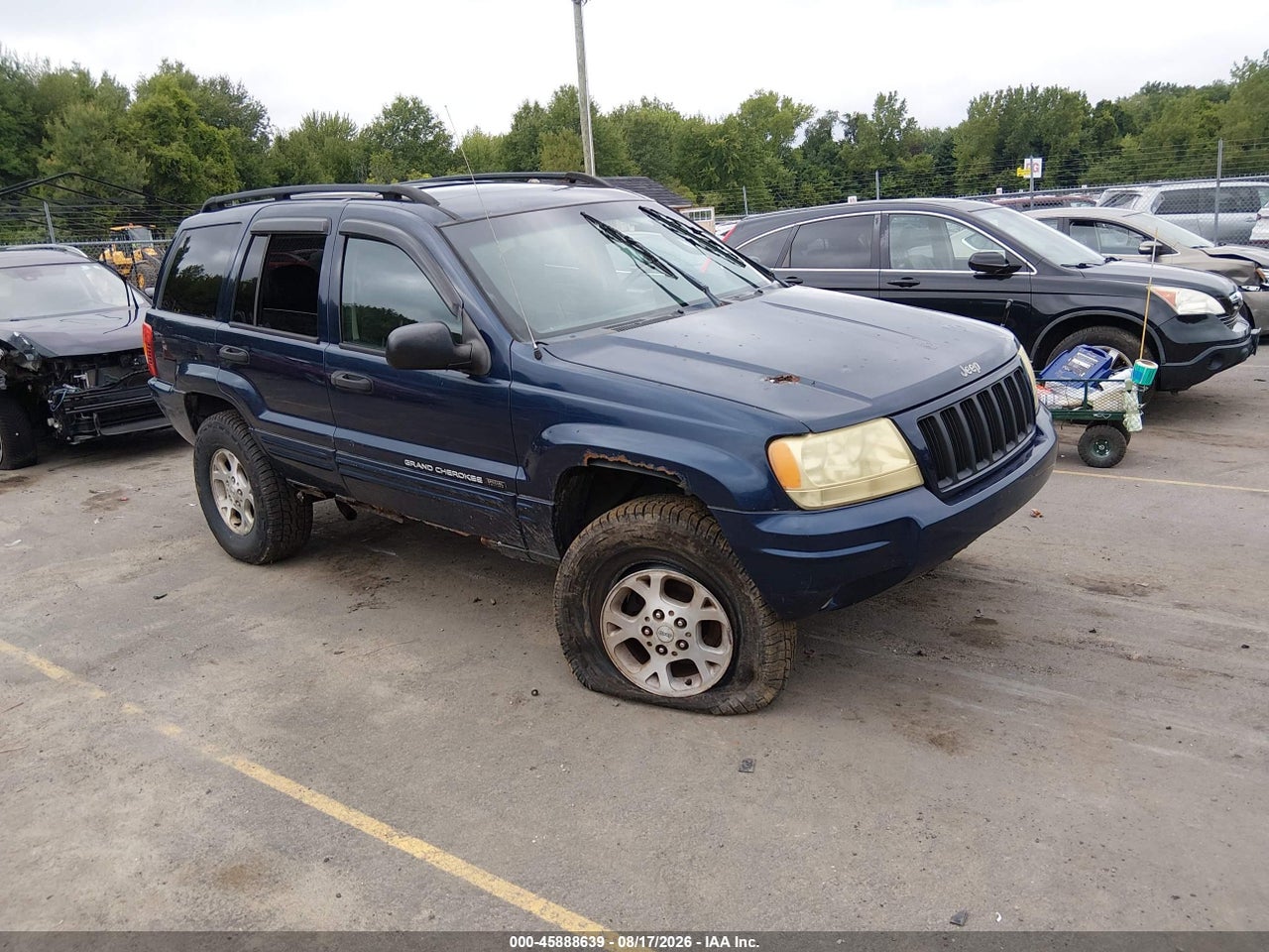 1J4GW48S34C****** · 2004 JEEP GRAND CHEROKEE LAREDO