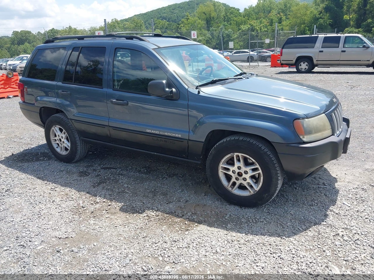 1J4GW48S04C****** · 2004 JEEP GRAND CHEROKEE LAREDO