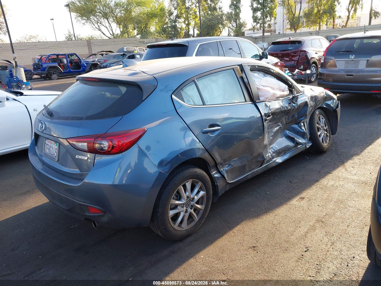 2014 MAZDA MAZDA3 I TOURING · 4/10