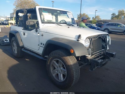 1J4FA24169L****** · 2009 JEEP WRANGLER X