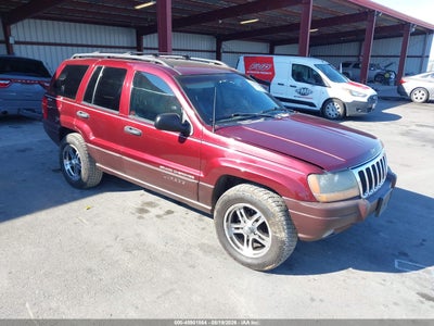 1J4GW48N11C****** · 2001 JEEP GRAND CHEROKEE LAREDO