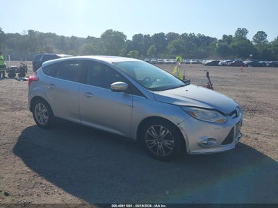 1FAHP3M29CL****** · 2012 FORD FOCUS SEL