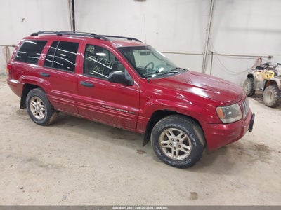 1J4GW48S84C****** · 2004 JEEP GRAND CHEROKEE LAREDO