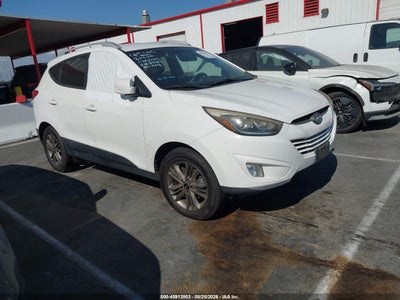 KM8JU3AG2EU****** · 2014 HYUNDAI TUCSON SE