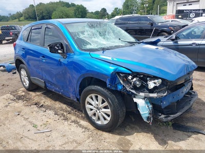 JM3KE4BE4E0****** · 2014 MAZDA CX-5 SPORT
