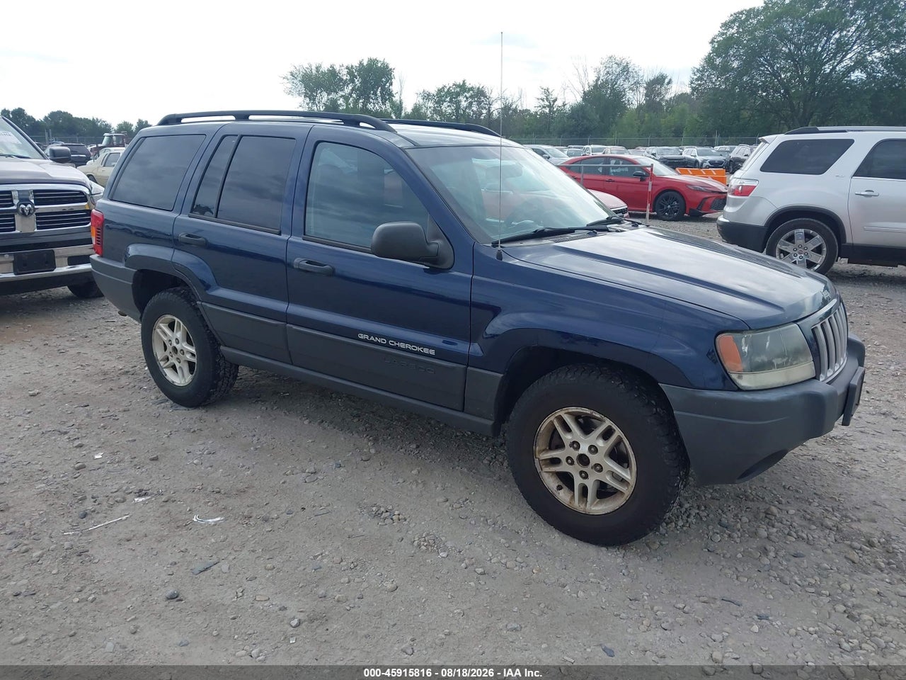 1J4GW48S14C****** · 2004 JEEP GRAND CHEROKEE LAREDO