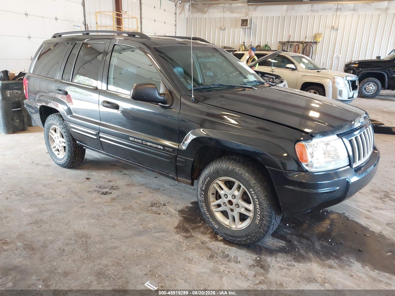 1J4GW48S44C****** · 2004 JEEP GRAND CHEROKEE LAREDO