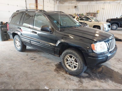 1J4GW48S44C****** · 2004 JEEP GRAND CHEROKEE LAREDO