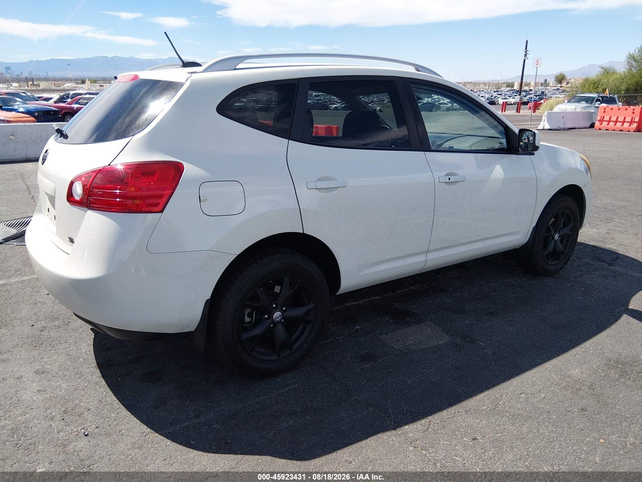 2009 NISSAN ROGUE SL · 4/11