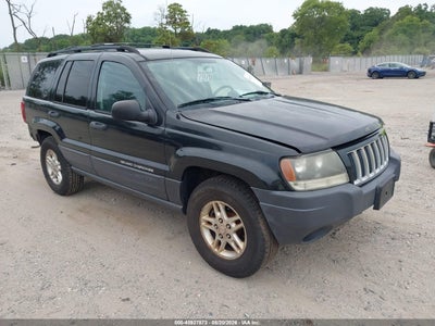 1J4GX48S44C****** · 2004 JEEP GRAND CHEROKEE LAREDO