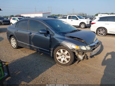 1HGFA16559L****** · 2009 HONDA CIVIC LX