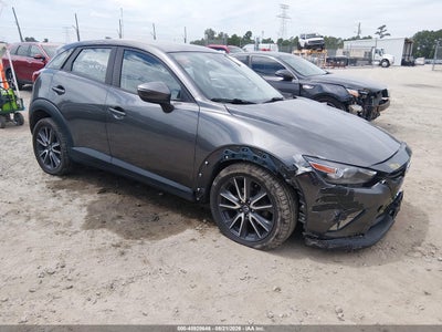 JM1DKFC70J1****** · 2018 MAZDA CX-3 TOURING