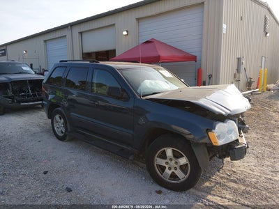 1J8GR48K97C****** · 2007 JEEP GRAND CHEROKEE LAREDO