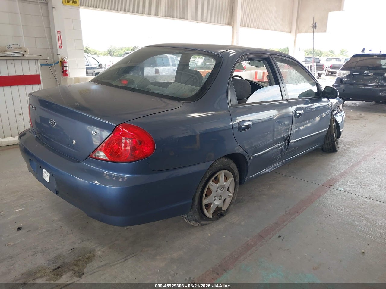 2003 KIA SPECTRA LS · 4/11