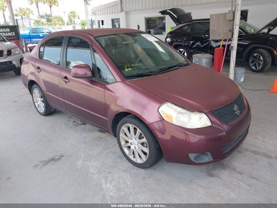 2011 SUZUKI SX4 LE/LE ANNIVERSARY EDITION