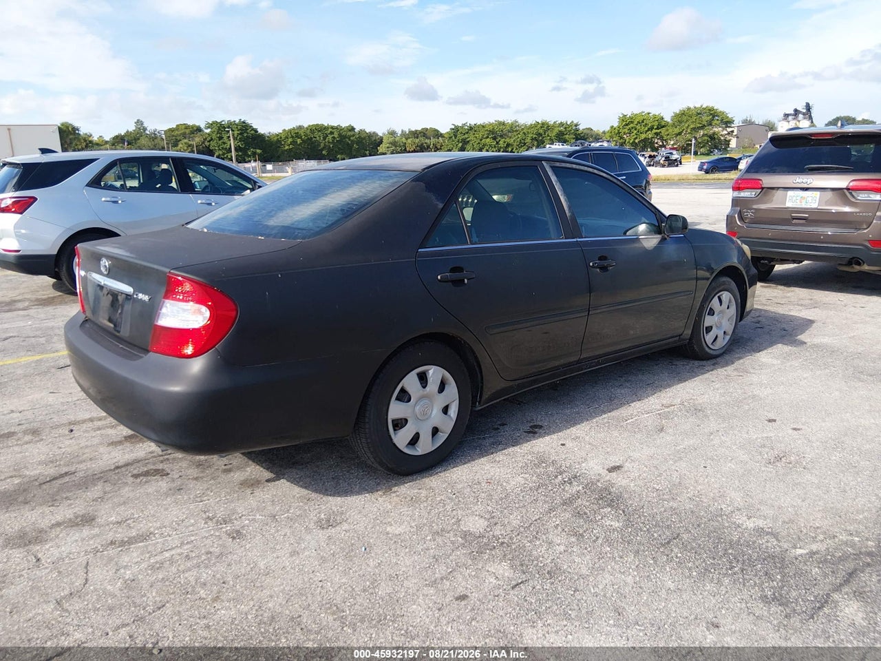 2002 TOYOTA CAMRY LE · 4/11
