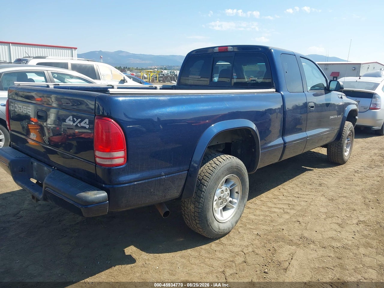 2002 DODGE DAKOTA SPORT · 4/11