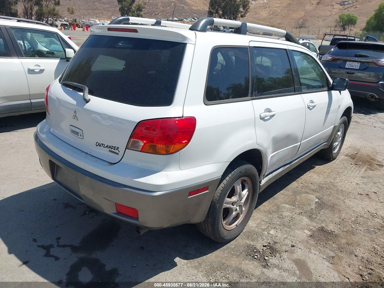 2004 MITSUBISHI OUTLANDER LS · 4/11