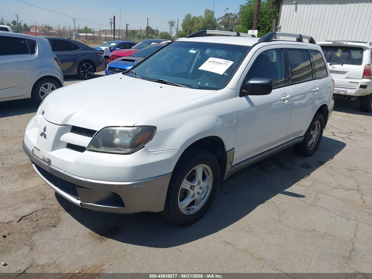 2004 MITSUBISHI OUTLANDER LS · 2/11