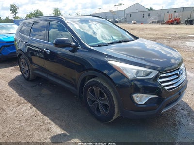 KM8SM4HFXEU****** · 2014 HYUNDAI SANTA FE GLS